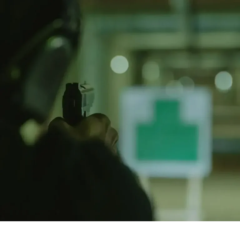Shooter Aiming on Target – Example of Tritium Night Sight Visibility